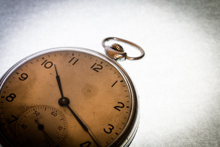 Russian antique pocket watch on white  backgroundの写真素材