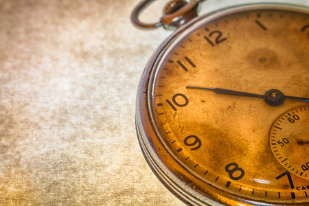 Russian antique pocket watch on brown abstract  background