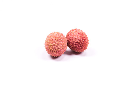 fresh lychees on white background