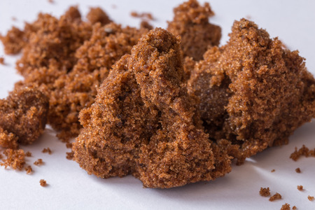  dark sugar and unrefined sugar cane close-upの写真素材