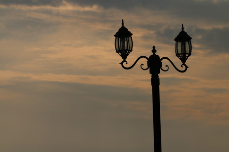 Street lantern lamp at  dramatic red sunset