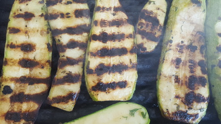 Roasted zucchini on grill or barbecue close-upの写真素材