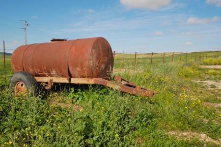 Rusty tank abandoned in the countryside の写真素材