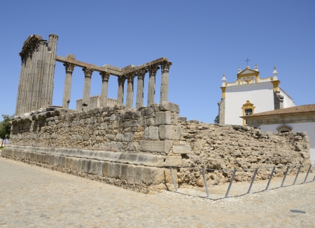 Roman ruins in a square located in the historical center of Evora, Portugal