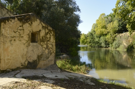 Old mill on the bank of the river Guadaira in Alcala, a village of the province of Seville, Andalusia, Spainの写真素材
