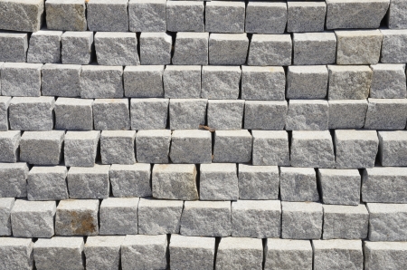 Background made with rows of grey stonesの写真素材