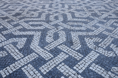 Typical drawing floor cobblestone in Lisbon, Portugalの写真素材