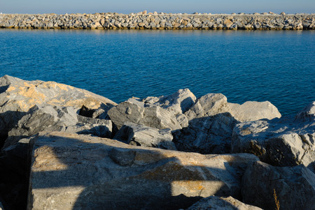 Piers at the Beach of Marbella, a village located in the south of Spainの写真素材