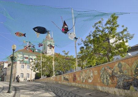 Street decorated with figures of crochet fishes next at the Town Hall Aveiro, Portugalのeditorial素材