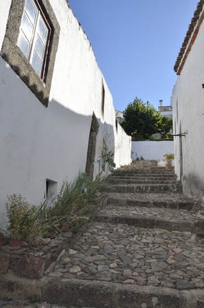 Cobbled street in the medieval village of Marvao, Portugalの写真素材