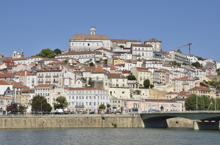 The city over the  river Mondego in Coimbra, Portugalのeditorial素材