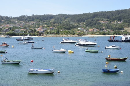 Boats at the sea in the fishing port of Aldan, in the province of Pontevedra, Galicia, Spain.のeditorial素材