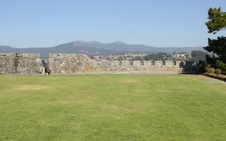 Cannon at the walls of the fortress in Monterreal Castle  in Ria of Vigo in Bayona, Galicia, Spain.のeditorial素材