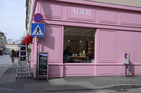 Pink cake shop on corner of street in Graz, the capital of federal state of Styria, Austria.のeditorial素材
