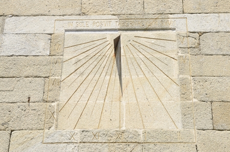 Sundial engraved on wall church in Pobra do Caramial, Galicia, Spain
の写真素材