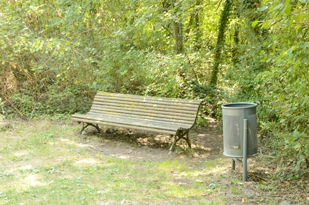 Iron bench in natural footpath in Olot,  Girona, Catalonia, Spain.の写真素材