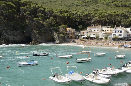 View of the beach of Sa Riera, a fishing village and holiday resort situated in  the Costa Brava, Girona, Catalonia, Spain.のeditorial素材