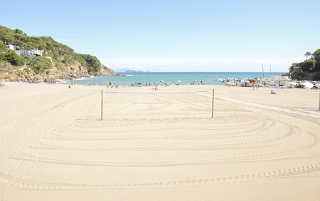 Summer day at the beach of Sa Riera, a fishing village and holiday resort situated in  the Costa Brava, Girona, Catalonia, Spain.のeditorial素材