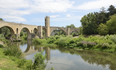 Stone bridge of Besalu, a medieval town of  Girona, Catalonia, Spain.のeditorial素材