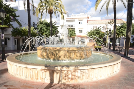 Fountain in a plaza of  Estepona, a town of the province of Malaga, Andalusia, Spain.のeditorial素材