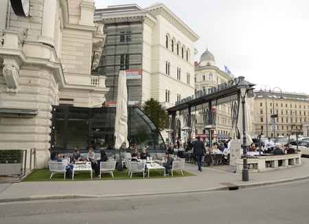 People at the terrace of the popular cafeteria "Landtmann",  in Vienna, Austria.のeditorial素材