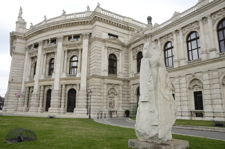 Modern stone sculpture on the grass around the Burgtheater, the National theater  in the city of Vienna, Austria.のeditorial素材