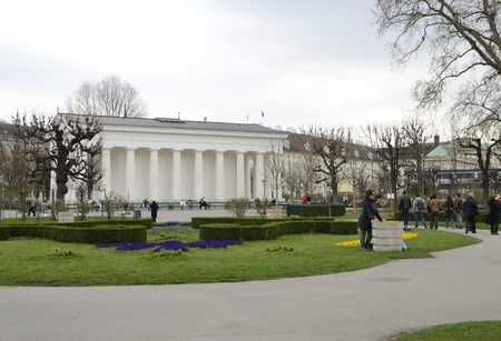 People at the exterior of the neoclassical Theseus Temple at the center of the public park Volksgarten (Garden of the people) in Vienna, Austria.のeditorial素材