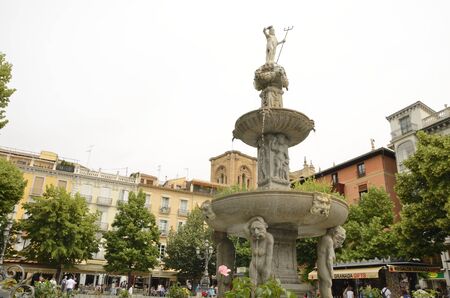 Stone fountain at Bib-Rambla plaza in Granada, Andalusia, Spain.のeditorial素材