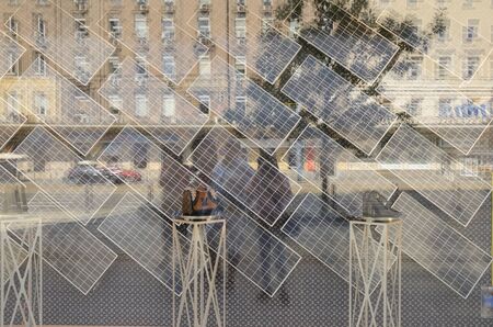 Warsaw, Poland - July 29, 2018: Urban reflections on the shop window at "Louis Vuitton" store in Warsaw, Poland.のeditorial素材