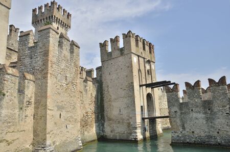 Sirmione, Italy - August 7, 2014: The Scaliger Castle, a medieval port fortification at Sirmione on lake Garda, Italy.のeditorial素材
