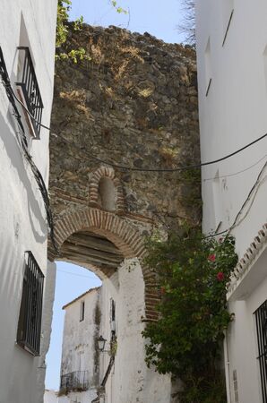 Stone archway in Casares, a  mountain village of Malaga province, Andalusia, Spain.の写真素材