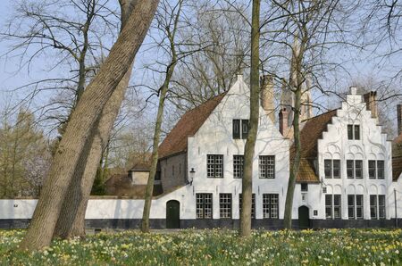 Brugge, Belgium - March 31, 2019: White buildings  at the Beguinage of Brugge, West Flanders,Belgium.のeditorial素材