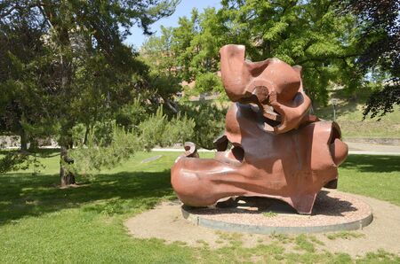 Pamplona, Spain - June 3, 2019: Modern red sculpture in Citadel Gardens by Vicente Larrea in Pamplona,  the capital of the Navarre Community, Spain.のeditorial素材