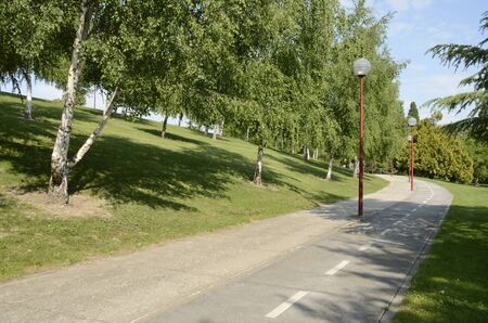 Footpath and carril bici in park of University campus in Pamplona, Navarre, Spain.