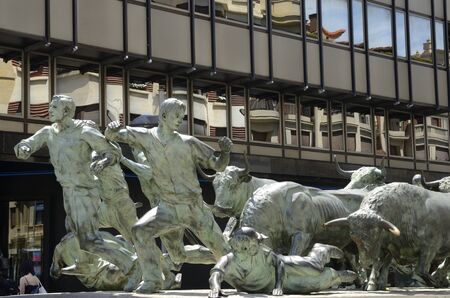 Pamplona, Spain - June 4, 2019: Monument in honor of the bull run, made by Rafael Huerta, in Pamplona,  the capital of the Navarre Community, Spain.のeditorial素材