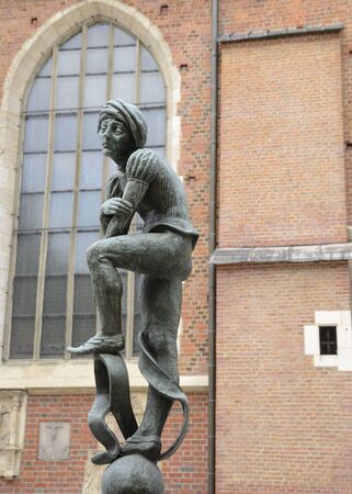 Krakow, Poland - July 25, 2018: Bronze sculpture in front of Saint Mary Church in the Main Market Square of Krakow, Poland.のeditorial素材