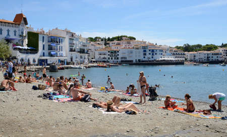 Cadaques, Spain - July 27, 2017: People on a summer day in the coastal village of Cadaques,  in the...