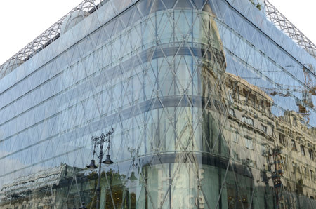 Budapest, Hungary - October 22, 2021: Reflects on crystal facade of contemporary mall in square of the Old Town of Pest, Budapest, Hungary.のeditorial素材