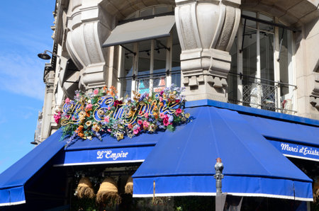 Paris, France - March 18, 2023: Blue awnings of restaurant in the second district of Paris, France.のeditorial素材