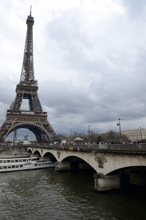 Paris, France - March 19, 2023: View of Eiffel Tower at the end of Jena Bridge in Paris, France.のeditorial素材