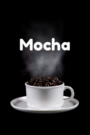 Cup of coffee and coffee beans on a black background.の写真素材