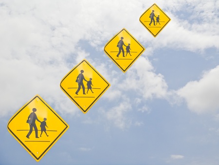 Walking across the street signs sky backgroundの写真素材