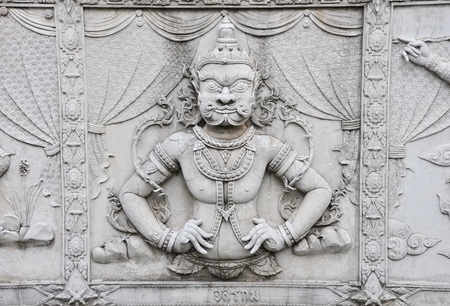 The statue on the wallの写真素材