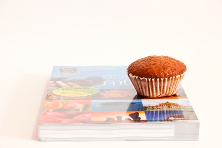 Place the bananas on a dessert book has a white backgroundの写真素材