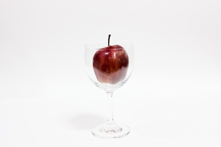 Apple red in the glassの写真素材