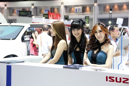 BANGKOK, THAILAND - MARCH 28 : An unidentified female presenter present at Isuzu booth  in the Thailand International Motor show 2012 at IMPACT Muang Thong Thani on March 28, 2012 in Bangkok, Thailand.のeditorial素材