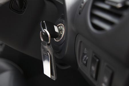Car ignition with key, close-upの写真素材