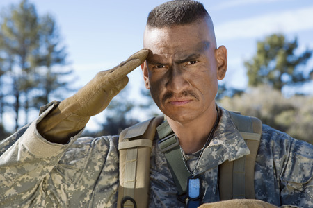 Portrait of saluting soldier