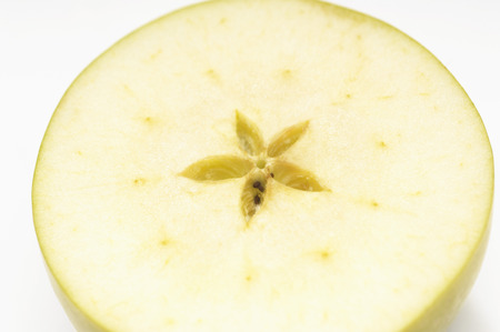 Cross section of granny smith appleの写真素材
