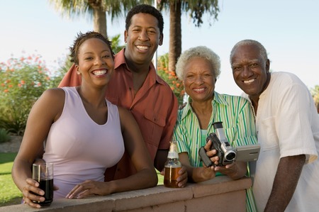 Family Together During Outdoor Barbecueの写真素材